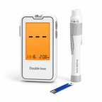 Blood glucose monitor kit with meter, lancing device, and test strip on white